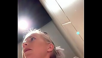 German Blonde Fingers Herself To Orgasm In Restaurant Restroom