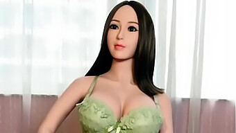 Sensual Asian Sex Doll In Green Swimwear With Large Breasts For Dog Style Position