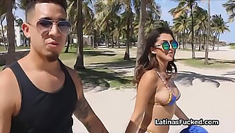 A Latina Woman With A Perfect Body Sunbathes On The Beach In A Bikini Before Engaging In Sexual Activities With A Man.